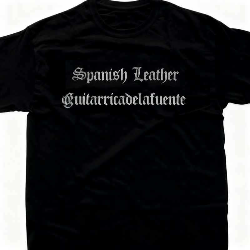 Diseño oficial de la playera de Guitarricadelafuente "Spanish Leather", impresión en blanco sobre algodón negro de alta calidad.