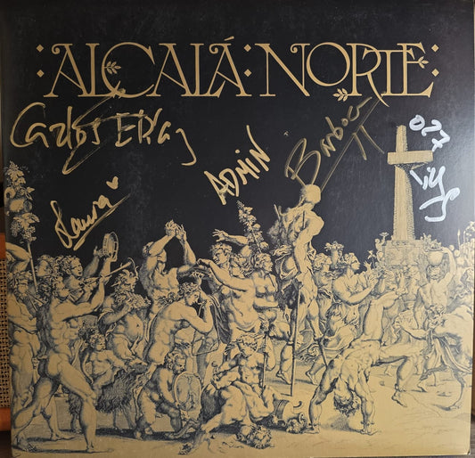 Primer plano en alta resolución del vinilo de Alcalá Norte mostrando la firma autógrafa original de la banda.