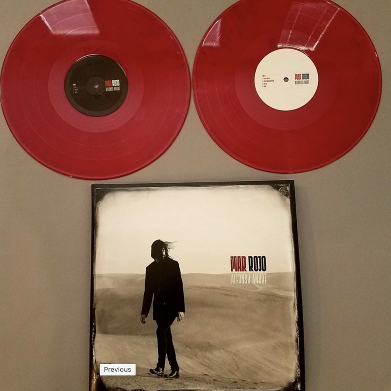 Portada del álbum solista de Alfonso André en formato vinilo, resaltando su faceta como artista independiente.