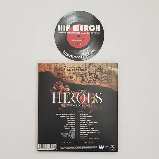 Fotografía de la contraportada de la edición en CD de Héroes: Silencio Y Rock & Roll, mostrando los títulos de los temas incluidos en los dos discos.