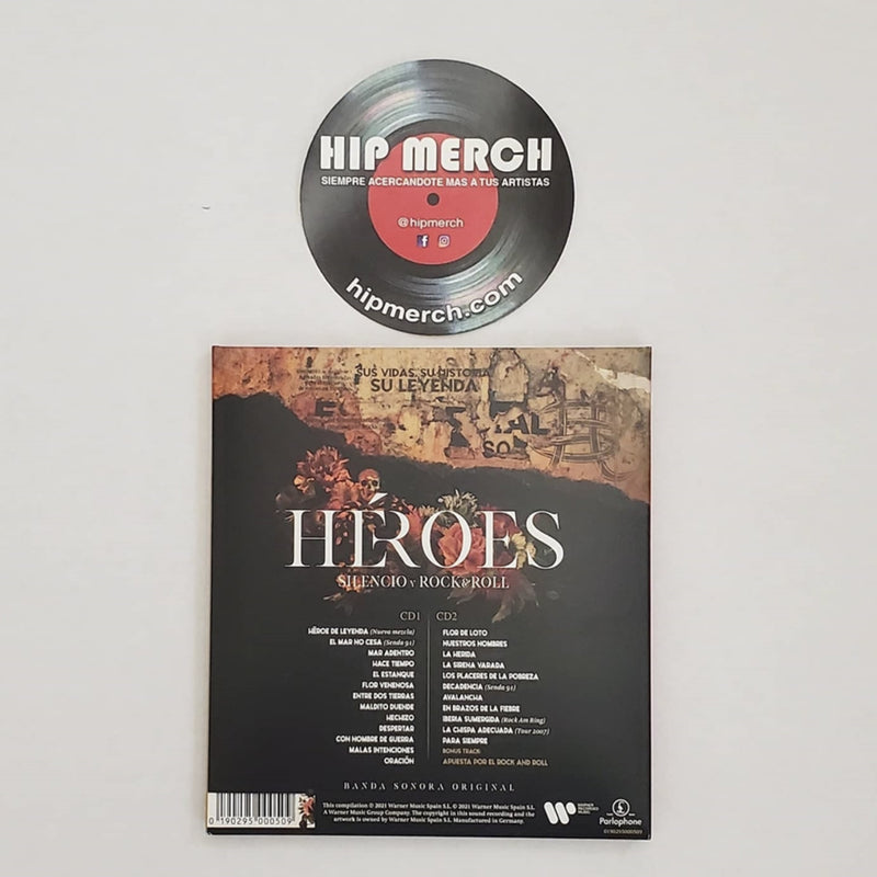 Fotografía de la contraportada de la edición en CD de Héroes: Silencio Y Rock & Roll, mostrando los títulos de los temas incluidos en los dos discos.