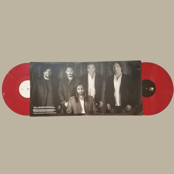 Primer plano del disco o funda de Alfonso André, destacando cualquier detalle especial (como si fuera una edición autografiada).