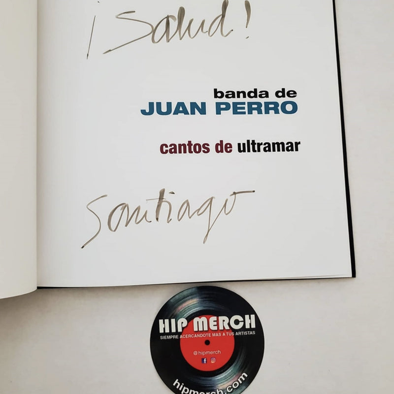 Fotografía de la página interior del libro Cantos De Ultramar mostrando la firma manuscrita auténtica de Santiago Auserón (Juan Perro).