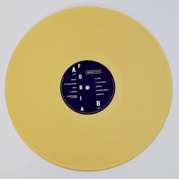 Fotografía del disco de vinilo de color amarillo correspondiente a la reedición especial del álbum Mundo Feliz de Fobia con su etiqueta central.