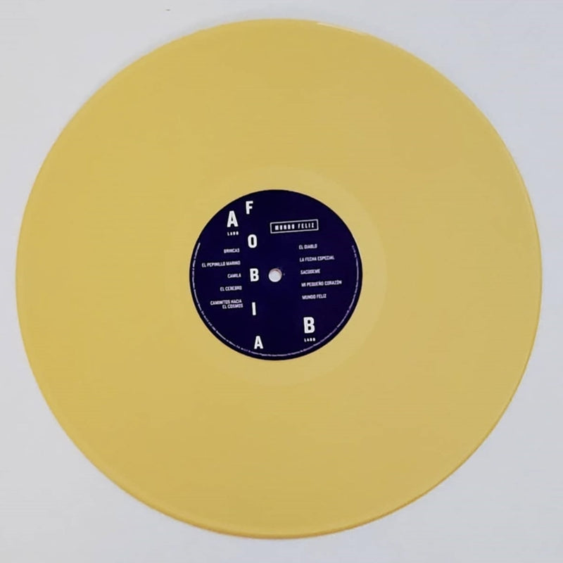 Fotografía del disco de vinilo de color amarillo correspondiente a la reedición especial del álbum Mundo Feliz de Fobia con su etiqueta central.