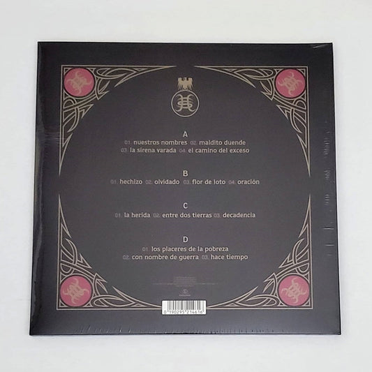 Fotografía de la contraportada del álbum Live In Germany de Héroes del Silencio con el listado oficial de canciones del concierto en Coblenza y detalles del empaque.