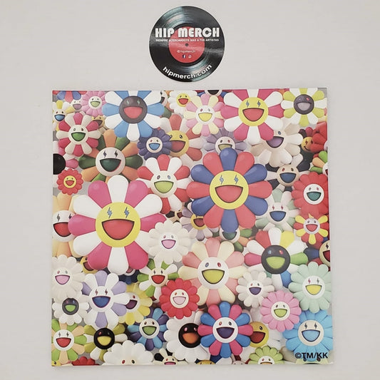 Fotografía de la contraportada de la edición en vinilo del álbum Colores de J Balvin, cubierta por completo con el patrón de flores sonrientes de Murakami.
