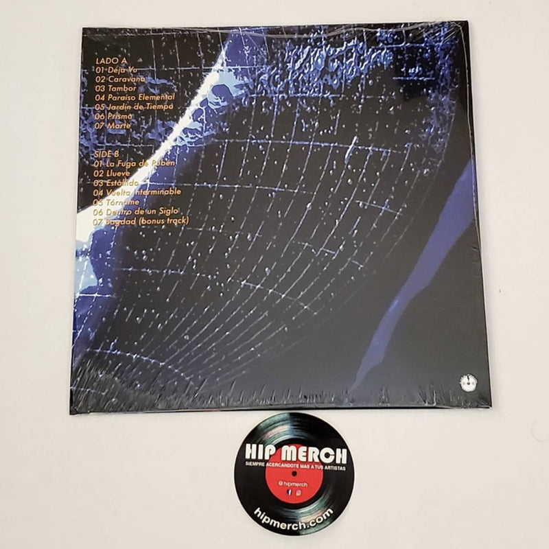 Fotografía de la contraportada del vinilo Rueda De Los Tiempos de La Barranca, mostrando el listado de canciones y el diseño gráfico en tonos azules.