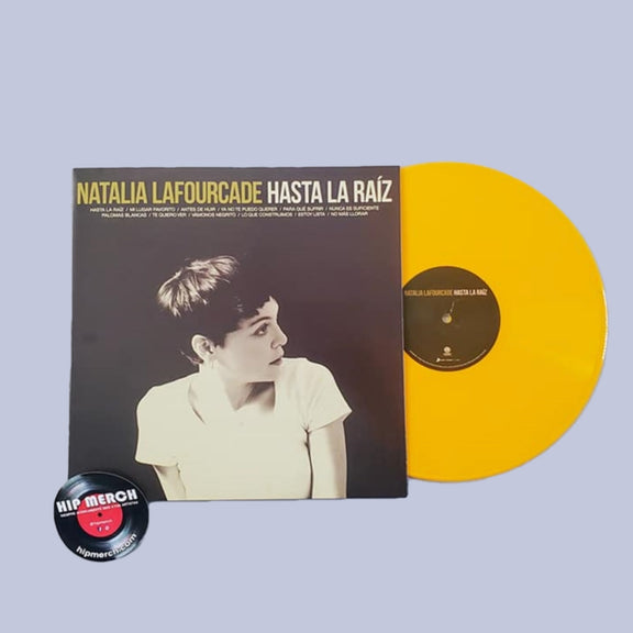 Portada del álbum 'Hasta la Raíz' de Natalia Lafourcade, destacando que es la edición especial en vinilo amarillo.